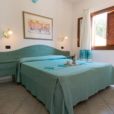 Isa Residence: Poolside Retreat With Air-conditioned Aparthotel Cala Liberotto